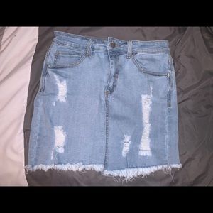 Distressed denim skirt